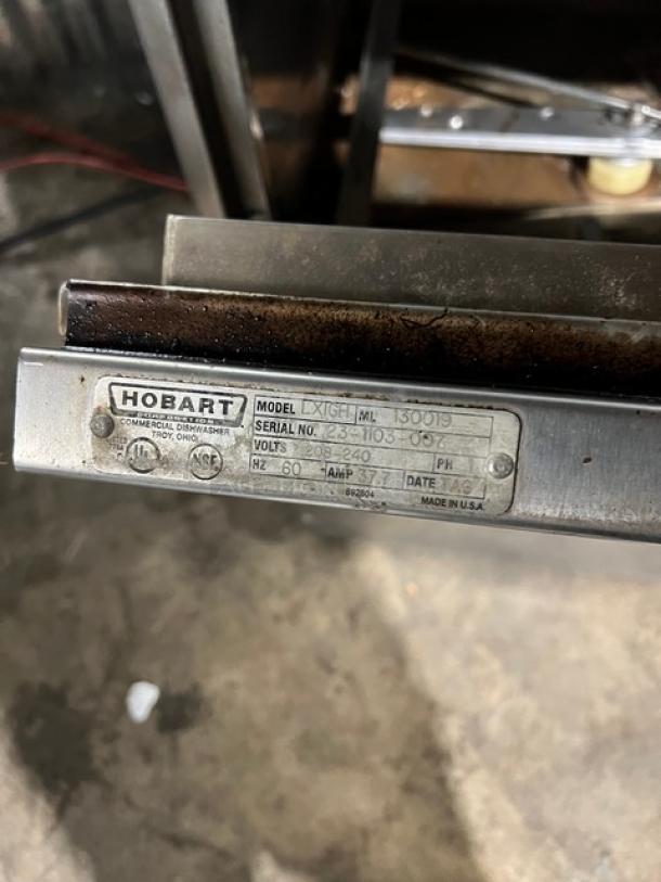 Hobart LXIGH under counter dishwasher, stainless steel, 208/240V, 1 phase, serial 23-1103-007, label visible.