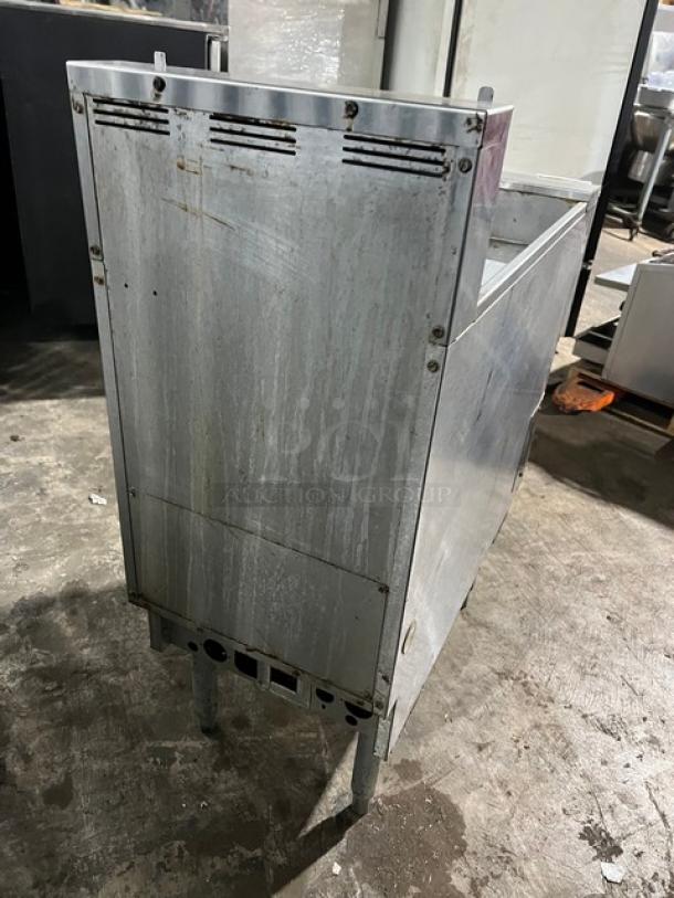 Pitco Solstice SE14T split tank electric fryer on legs, showing back panel; used condition, Model SE14T, Serial E10CD008548.