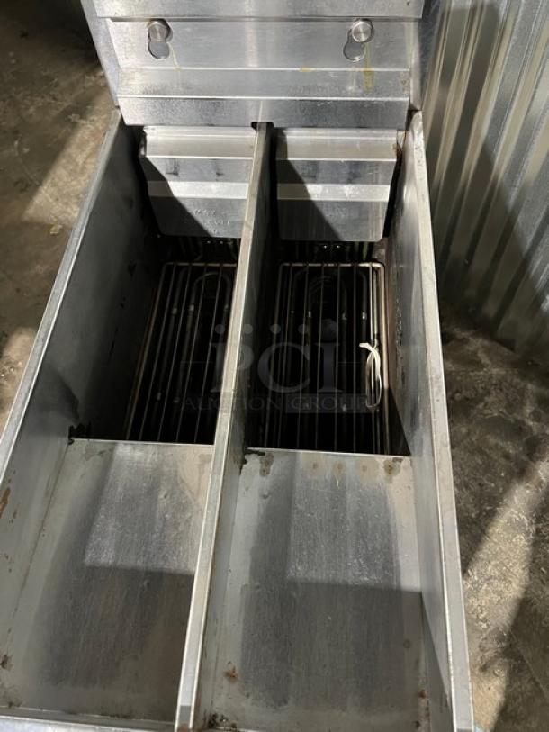 Pitco Solstice SE14T split tank electric fryer, model SE14T, with individual controls and on legs.