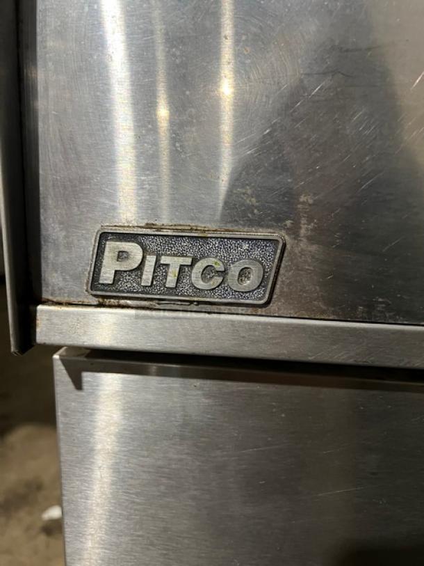 Pitco Soltice SE14T split tank electric fryer with individual controls, stainless steel, on legs, showing Pitco logo.