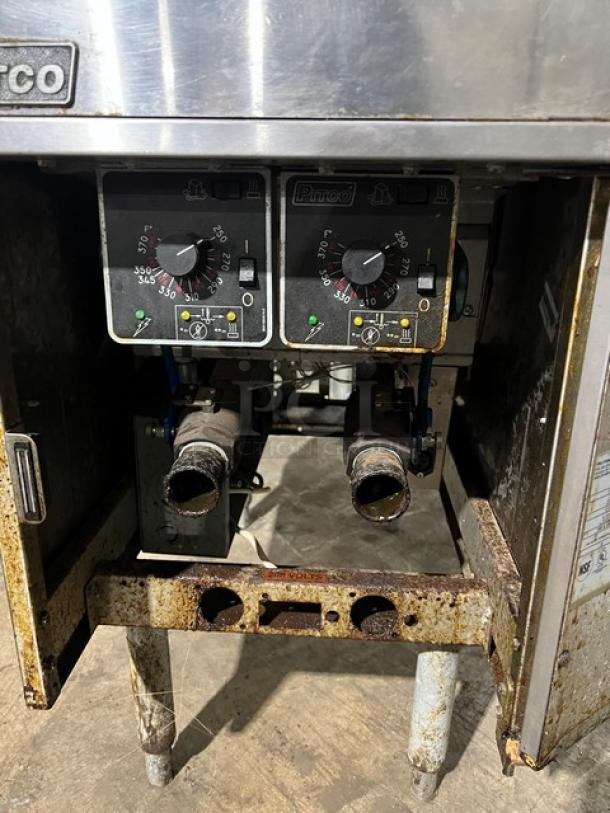 Pitco Soltice SE14T split tank electric deep fat fryer with individual controls, on legs, showing control dials.
