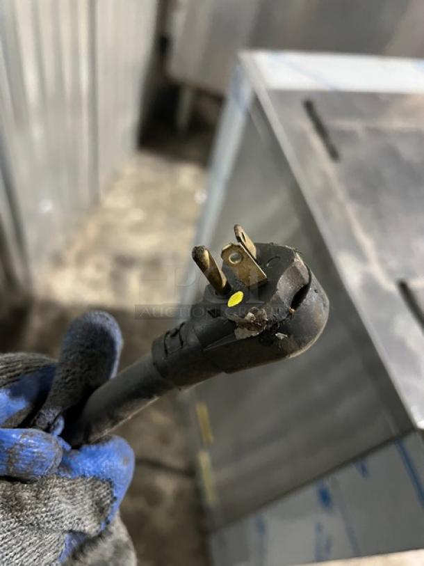 Hatco Toast King TK135B plug close-up, showing minor wear. 240V, 1 phase. Essential for countertop vertical toaster oven.