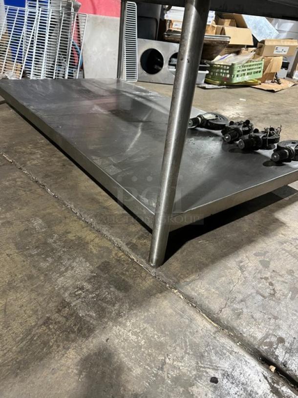 Micro Drive electric pizza oven on stainless steel stand with casters, industrial setting, durable and efficient design.