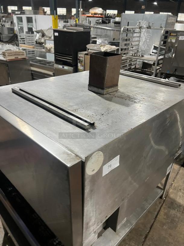 Micro Drive stainless steel conveyor pizza oven on stand with casters, electric powered, visible wear, label marked "76."