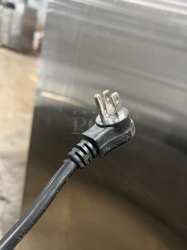 Close-up of the power plug for Avantco 2 Door Reach In Freezer, 115V, Model 178A49FHC.