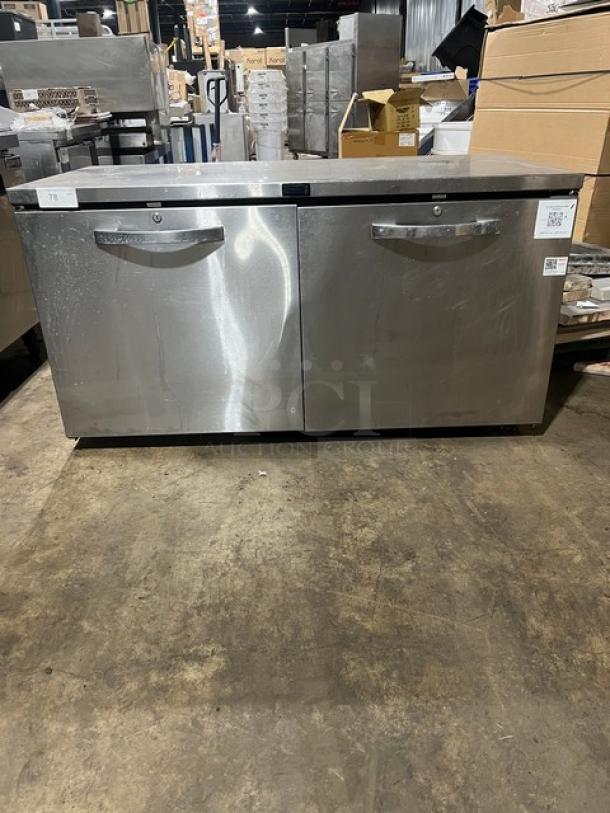 True TUC60 stainless steel refrigerated work top lowboy cooler, 115V, 1 phase, on casters. Model and serial labels visible.