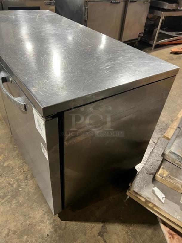 True TUC60 stainless steel refrigerated worktop cooler, model TUC60, serial 10343969. Features casters, 115V, 1 phase.