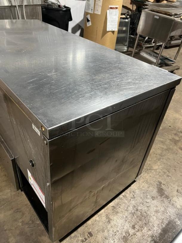 True TUC60 Stainless Steel Refrigerated Work Top Lowboy Cooler, serial 10343969, 115V 1 Phase, on casters, used condition.