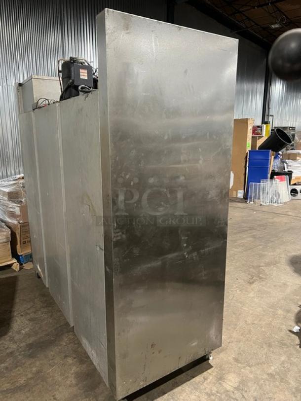 Traulsen 6 split door reach-in cooler with built-in pan racks, on casters, 115V 1 phase, stainless exterior, used condition.