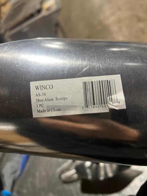 Winco AS38 aluminum ice scoop, 38 oz capacity, new condition, model label visible, made in China, auction item.