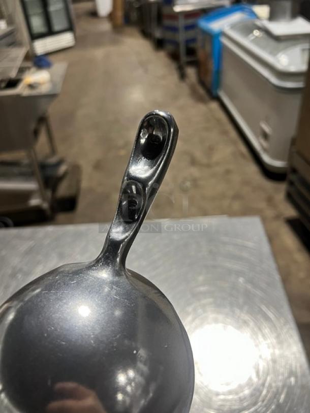 Winco aluminum ice scoop, model AS38, new condition, sleek design, offers durability and efficiency.