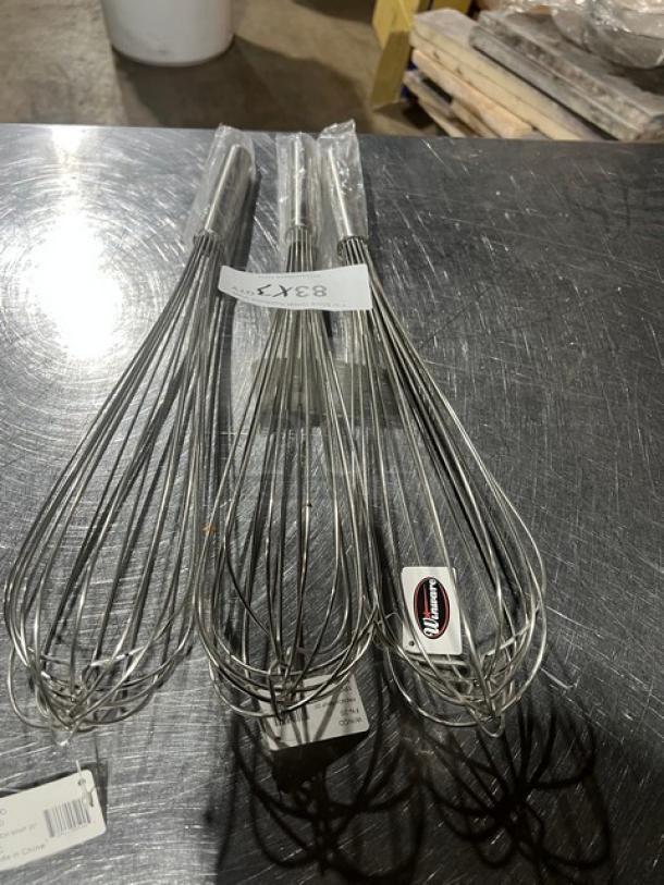 New Winware FN20 hand held whisks, set of 3. Stainless steel construction, new condition, original tags visible.