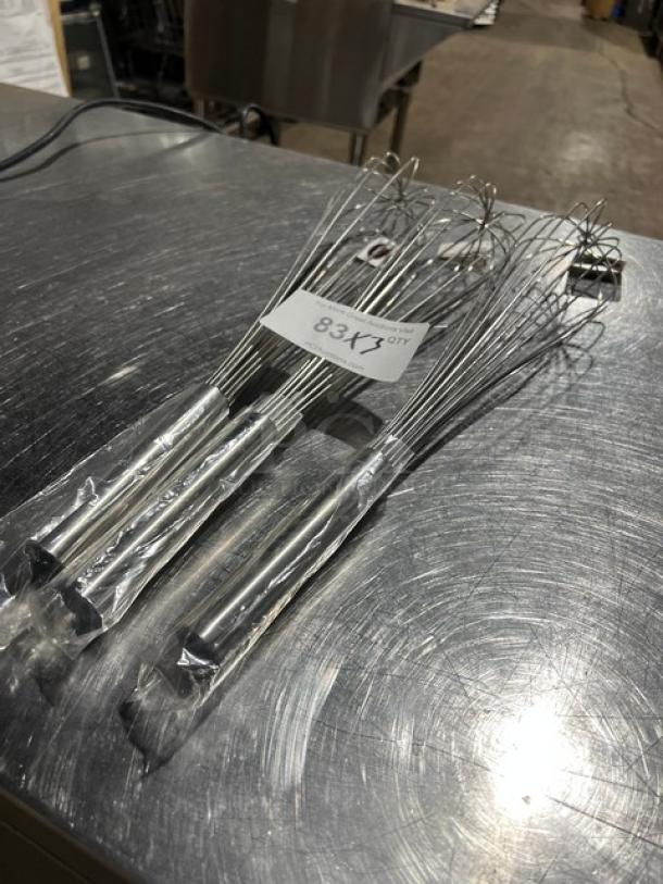 New Winware FN20 hand-held whisks, sealed in plastic, set of three. Stainless steel, new condition.