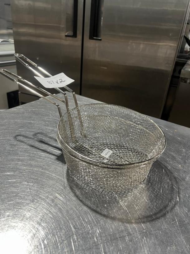 Brand new Winco model FB10-M culinary basket, stainless steel mesh, dual handles.