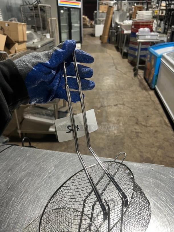 Brand new Winco culinary basket FB10-M with tag, made of stainless steel, pristine condition, pair included in auction.