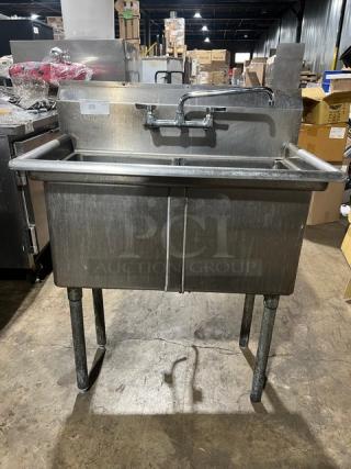 L & J stainless steel 2-compartment wash/prep sink with attached faucet, commercial-grade and durable, good condition.