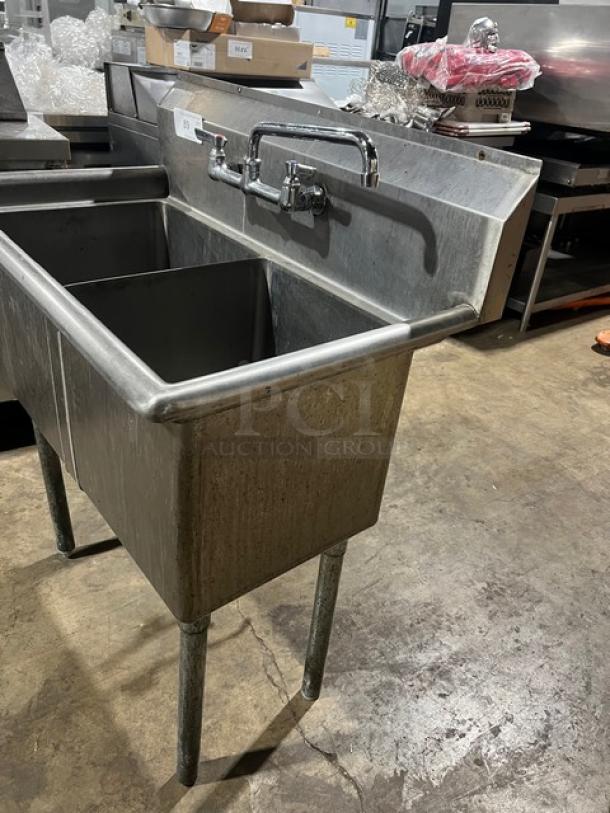 L & J stainless steel 2-compartment wash/prep sink with faucet, shown in a kitchen setting. Sturdy condition.