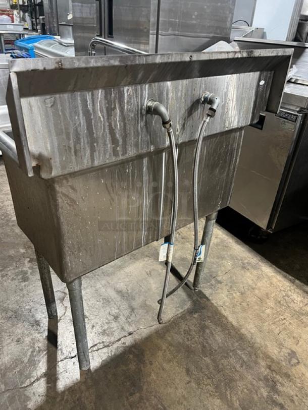 L & J stainless steel 2-compartment wash/prep sink with faucet, visible water marks, suitable for commercial use.