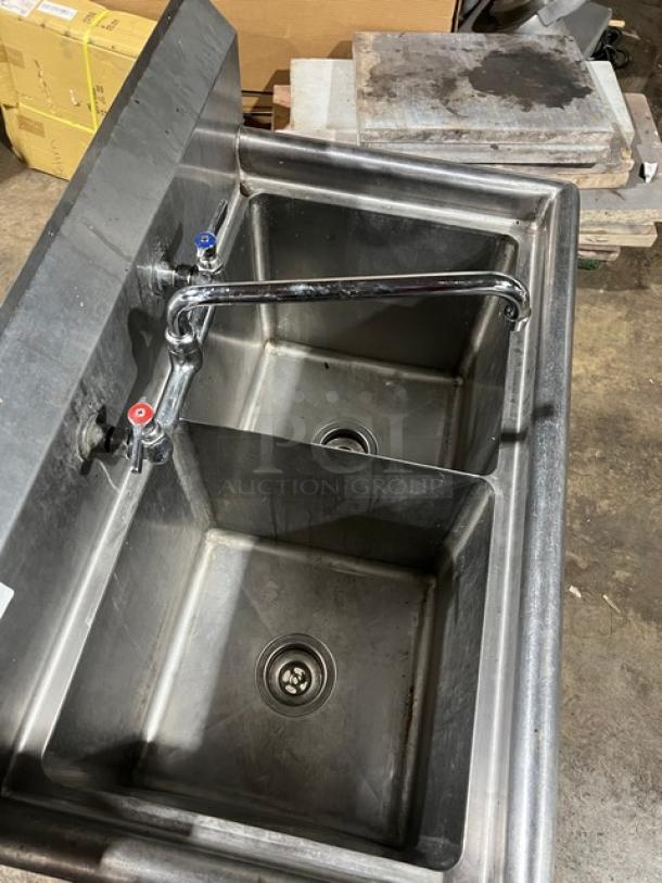 L & J all stainless steel 2-compartment wash/prep sink with faucet, good condition, visible drain and hot/cold handles.