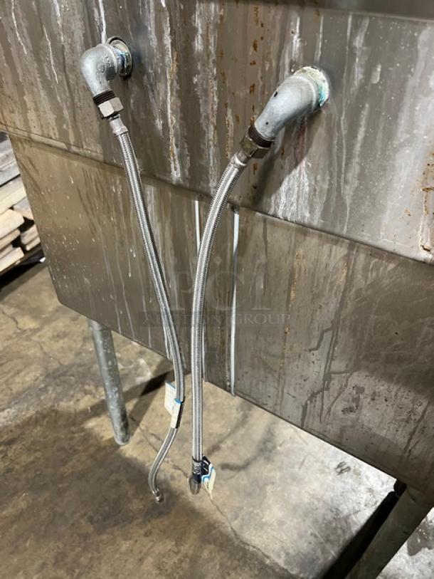 L & J all stainless steel 2-compartment wash/prep sink with faucet. Features durable construction, visible wear.