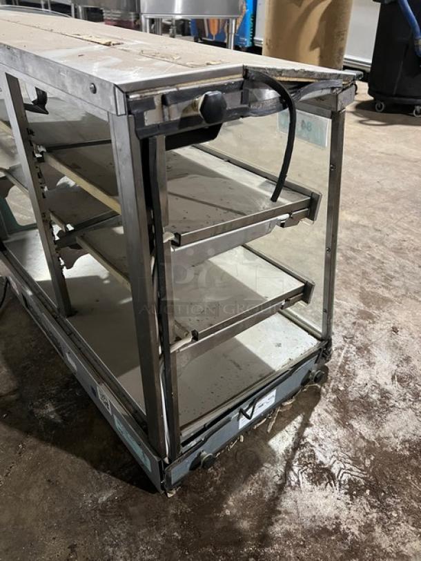 Vendo electric 3-tier heated food merchandiser, Model HFDC00002, stainless steel, glass panels, used condition.