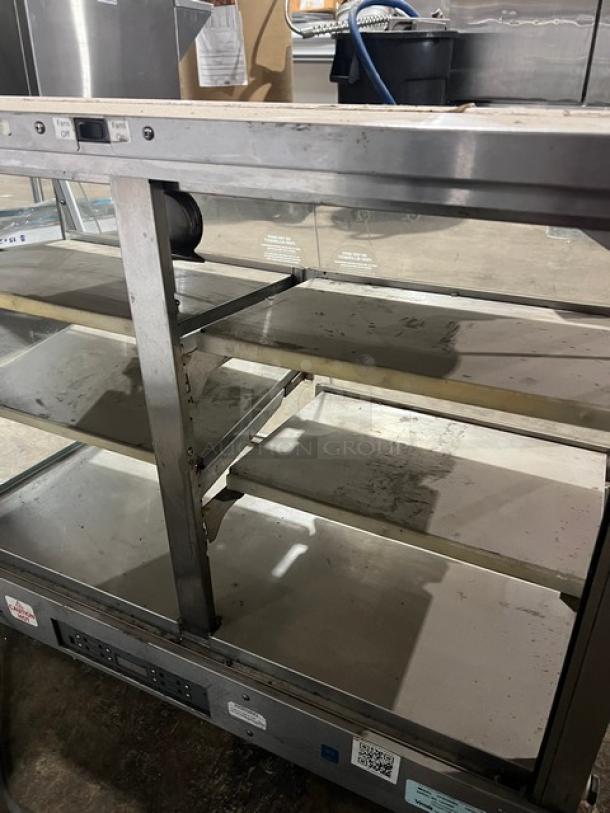 Vendo 3-tier heated merchandiser, model HFDC00002. Electric, self-serve food warmer, used condition; serial 142345H.