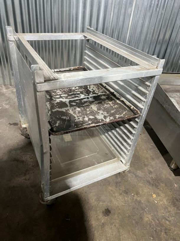 Cres Cor heavy-duty half rack sheet pan rack on casters, aluminum frame, holds multiple pans, used condition, industrial setting.