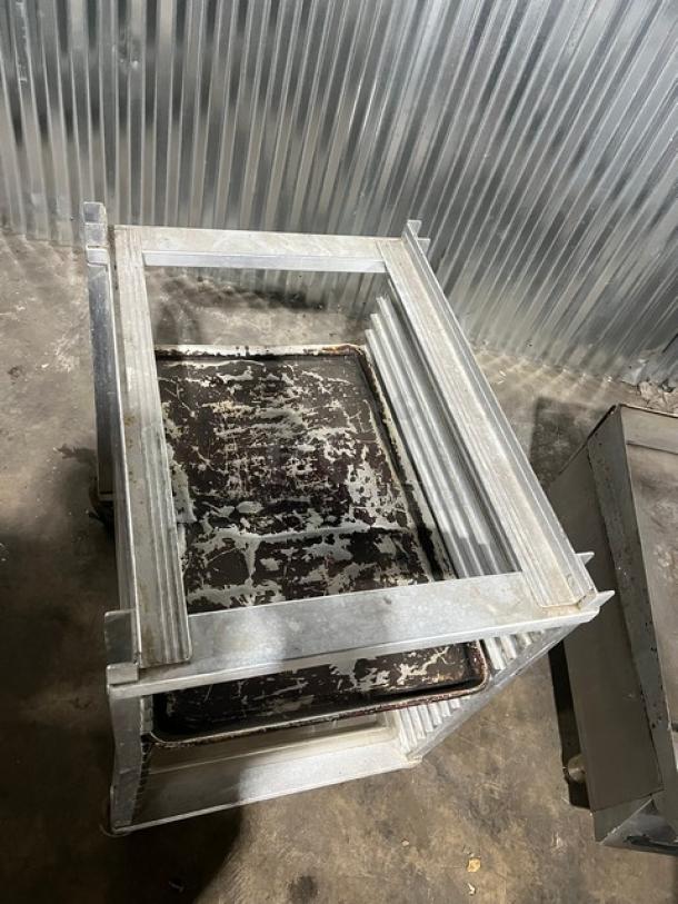 Cres Cor heavy duty half rack sheet pan rack on casters, metal construction, used condition with visible wear.