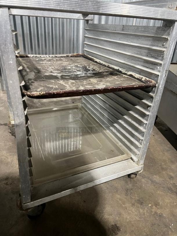 Cres Cor heavy-duty half rack sheet pan rack with casters; features slotted shelves, sturdy frame, and visible wear.
