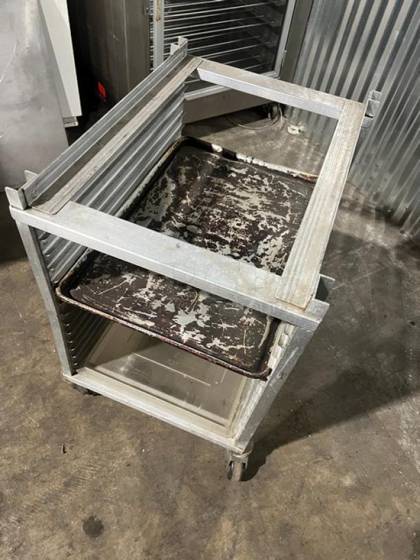 Cres Cor heavy duty half rack sheet pan rack with casters, metal construction, shows signs of wear, industrial use.