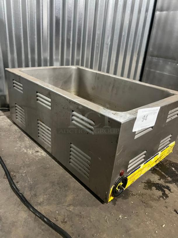 Qualite FW1200WF countertop food warmer, 115V 1Phase. Stainless steel, visible control dial, fair condition.