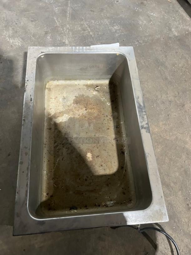 Qualite Model FW1200WF countertop food warmer, 115V, 1 Phase, stainless steel, used condition with visible wear.