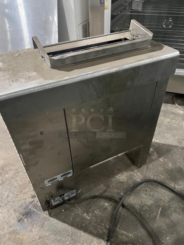 Antunes VCT-1000CV stainless steel vertical contact toaster, double-sided, electric, model VCT-1000CV, on legs, visible serial tags.