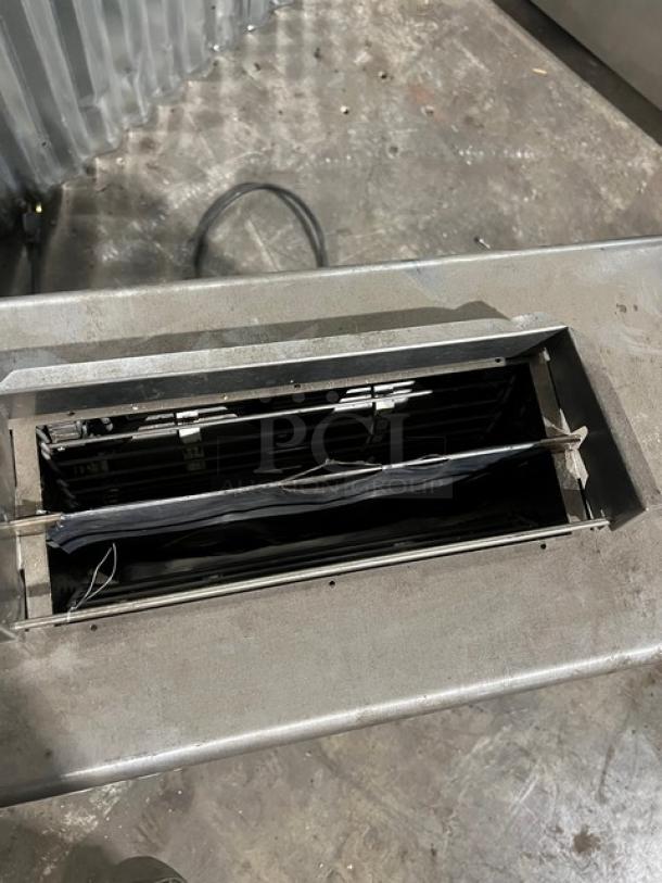 Antunes VCT1000CV countertop vertical contact toaster, stainless steel, double-sided toasting, 208-240V, on legs.