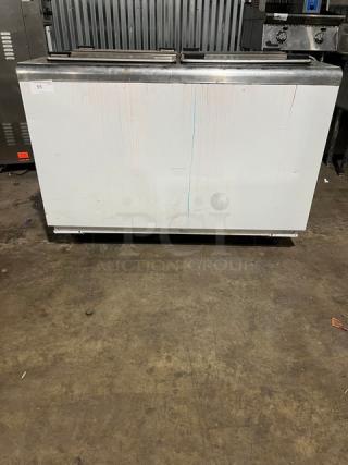 Kelvinator Commercial White Ice Cream Dipping Cabinet with flip-top lid, on casters, minor surface marks, good condition.