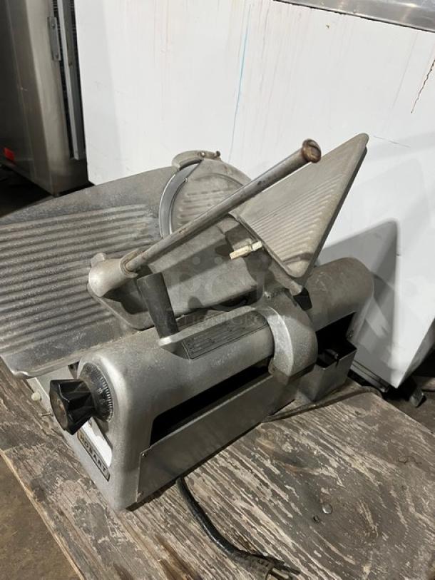 Hobart Model 1612 commercial deli meat slicer, countertop electric, serial 11-128-507, in used condition.