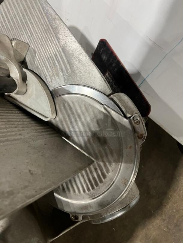 Hobart Commercial Electric Countertop Deli Meat Slicer, Model 1612, features stainless steel blade, in used condition.