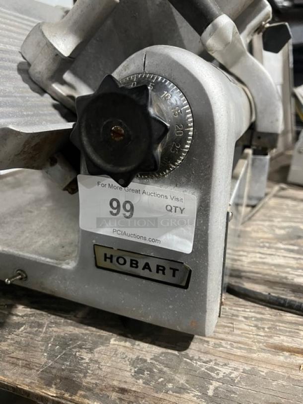Hobart Commercial Electric Countertop Deli Meat Slicer, Model 1612, featuring adjustment dial, good condition, visible brand plate.