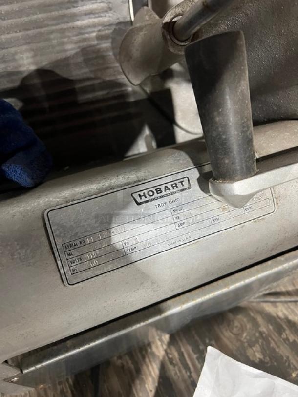 Hobart 1612 commercial electric deli meat slicer, countertop model, metal construction, serial number 11-128-507.