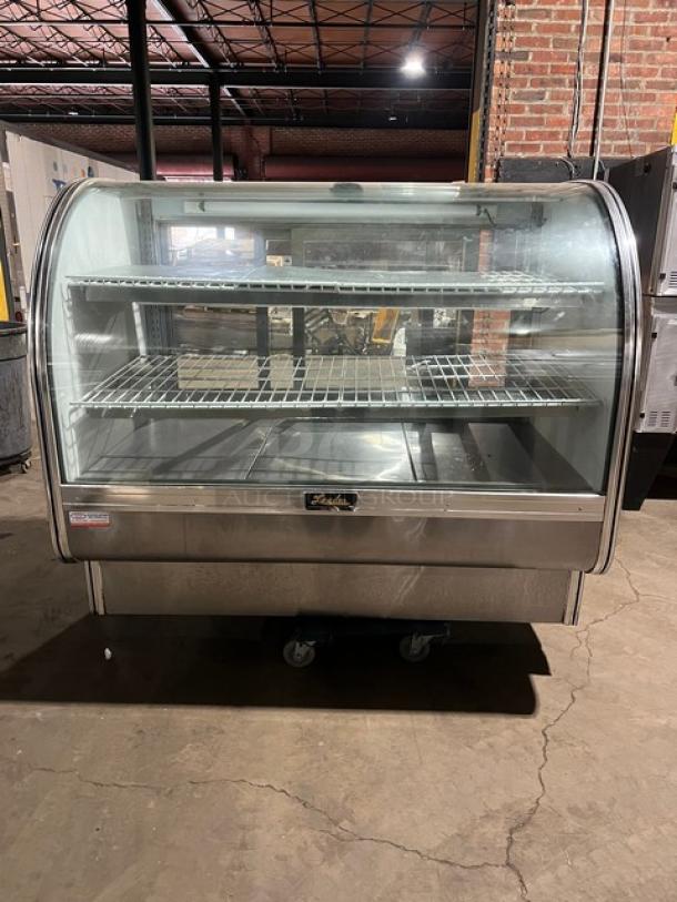 Leader Commercial Stainless Steel Curved Glass Bakery Display Case, 3-Tier, Model: 115V 1 Phase, rear sliding doors, poly-coated rack.