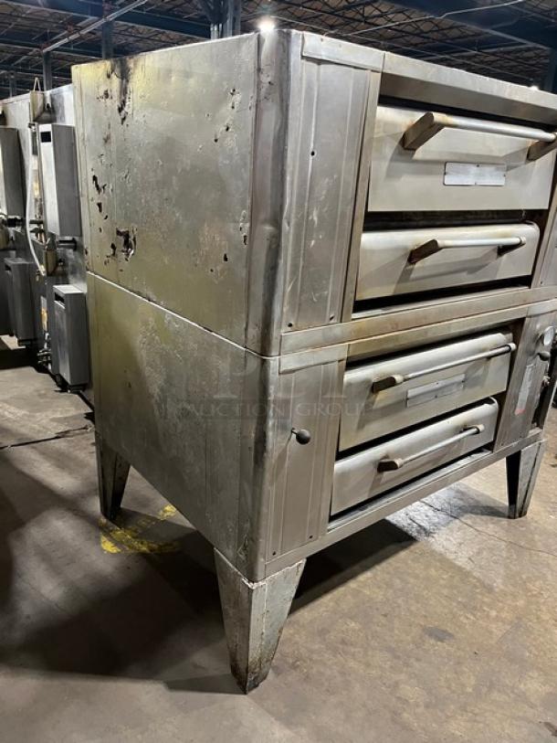 Bari M6PS natural gas double-stacked pizza oven, stainless steel, fits 4 pies, on legs, visible wear, Model 2446.
