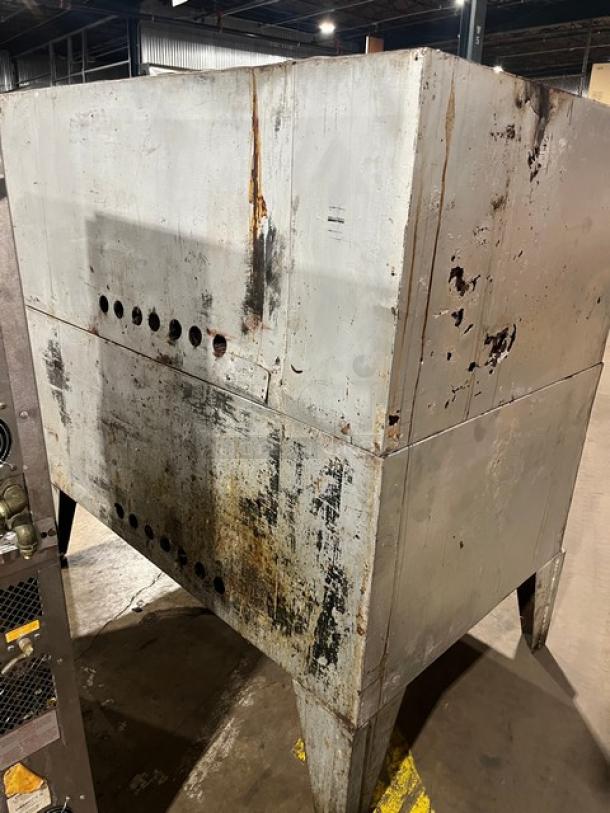 Bari M6PS double-stacked pizza oven, natural gas powered, model 2446, on legs, visible wear, industrial kitchen equipment.