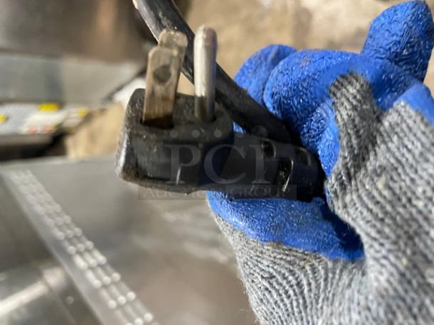 Close-up of power plug for APW Wyott HRS-755T hot dog roller grill, model HRS750622A0146, 208/240V 1 Phase.