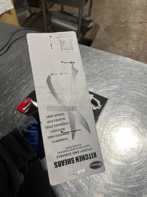 Winware KS03 kitchen shears in original packaging, stainless steel blades, serrated edge, durable for tough kitchen tasks.