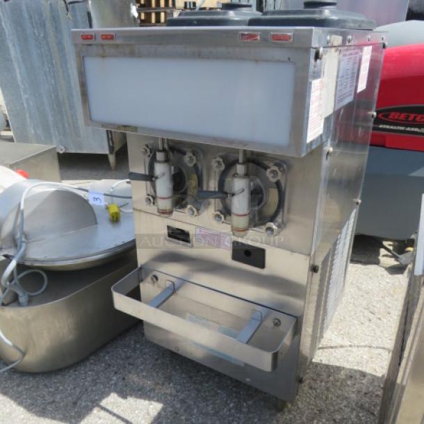 Taylor 432-27 2-flavor frozen beverage machine, stainless steel, 208-230V, 1 phase, 19"x28"x38", used condition.