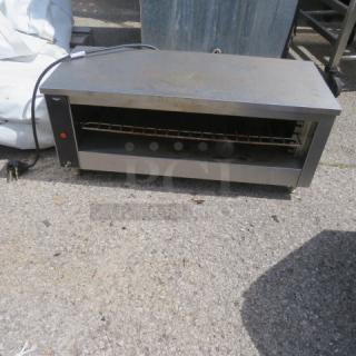 Vollrath Electric Cheese Melter, Model JW30PA, 208 Volt, dimensions 35x14.5x15 inches, unable to test.