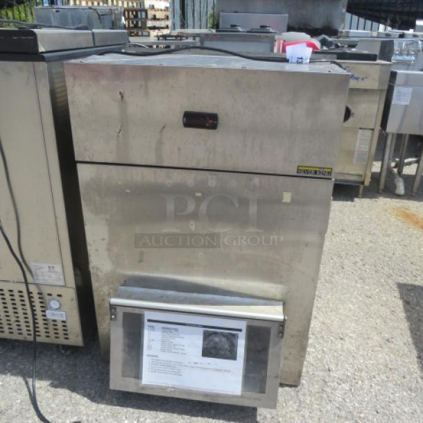 Silver King SK2SB/C17 refrigerated lettuce crisper, 25x23x36 inches, 115 Volt, stainless steel, working condition, $3525.00.