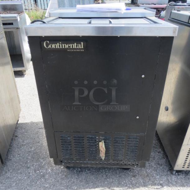 Continental Bottle Box, Model CBC24, 24x28x40 inches. Black, used condition, labeled; non-functional cooling, 115 volts.