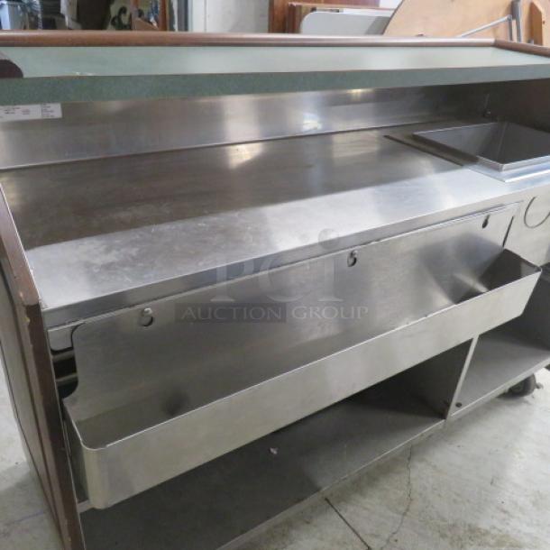 FWE Portable Bar, Model AS-CB-6-MW, with mahogany trim, SS under shelf, storage, ice well, bottle rail, on casters, 74x27x46.