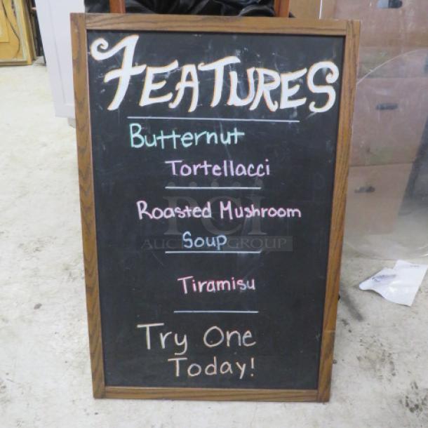 Wooden framed menu sign, 24x36 inches, featuring handwritten daily specials: Butternut Tortellacci, Roasted Mushroom Soup, Tiramisu.